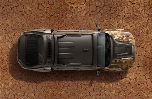Jeep in camouflage paint top view