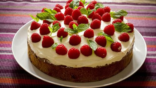 Cake decorated with raspberries