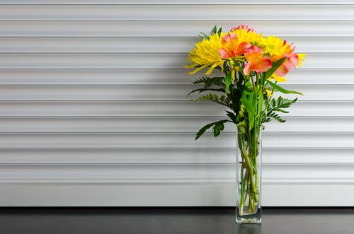 A bouquet of flowers in a transparent vase