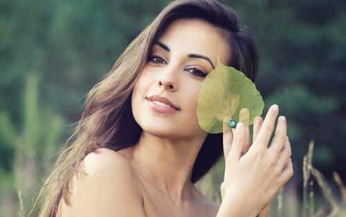 Lorena Garcia is photographed with a green leaf