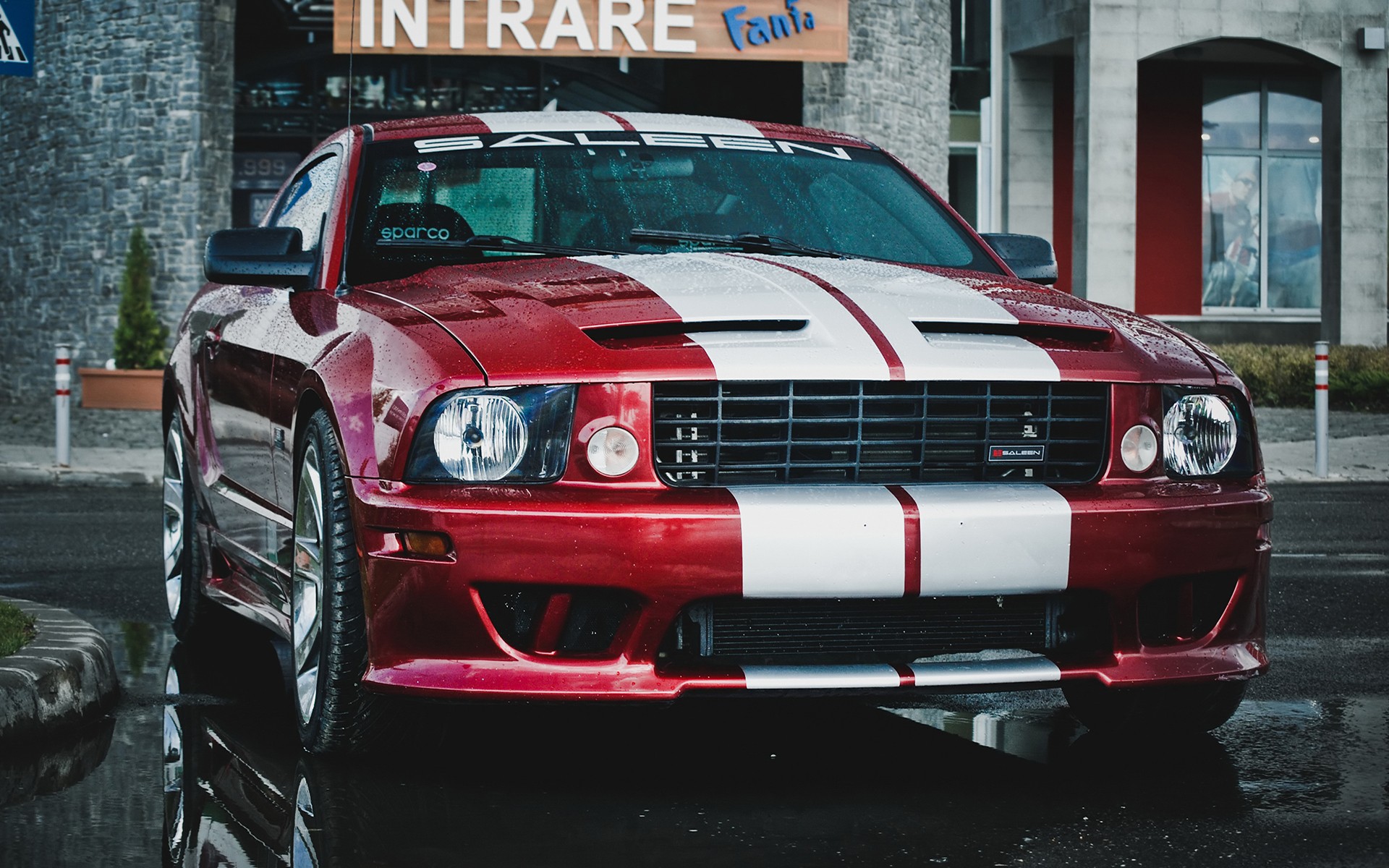 Free photo Red Ford Mustang with white stripes