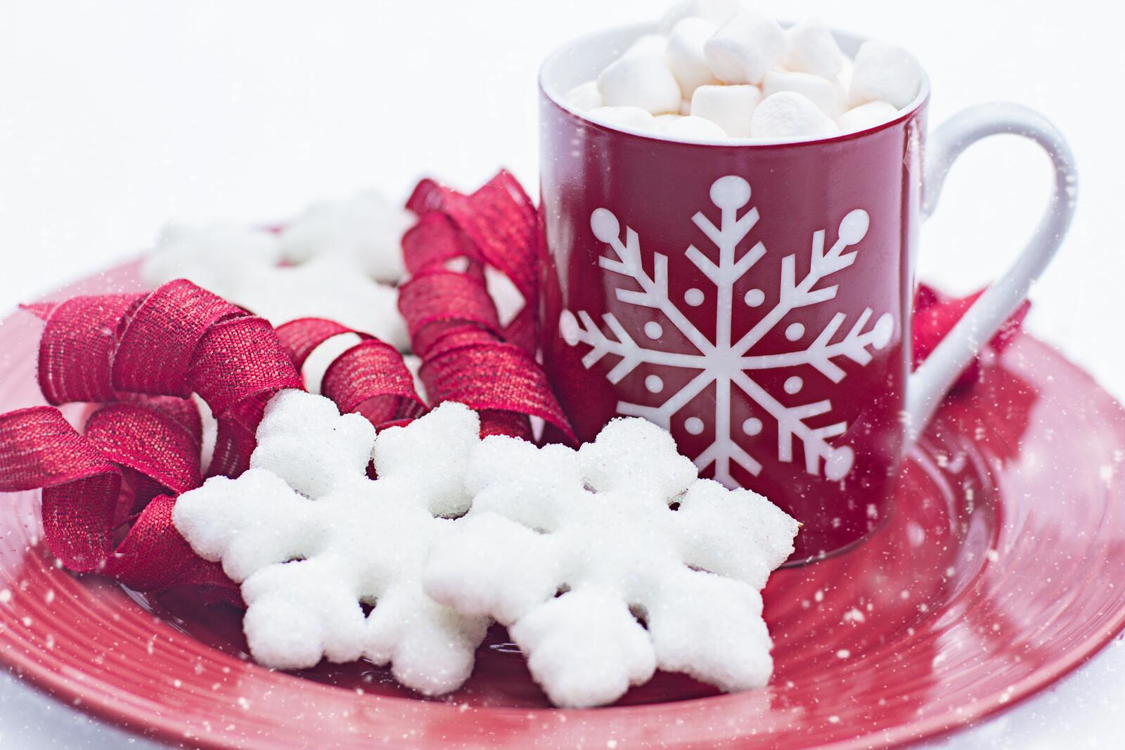 Free photo New Year`s red mug with saucer