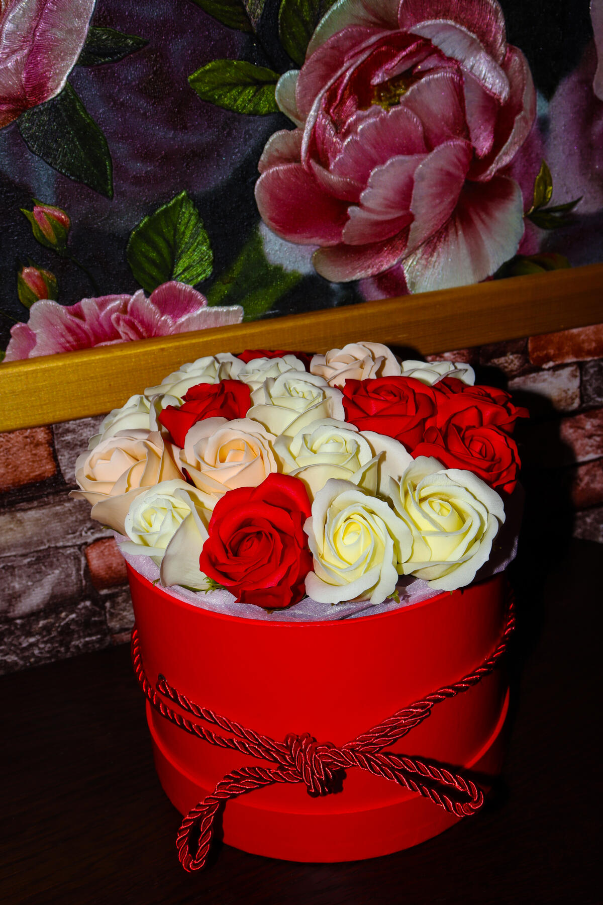 A big red box of roses