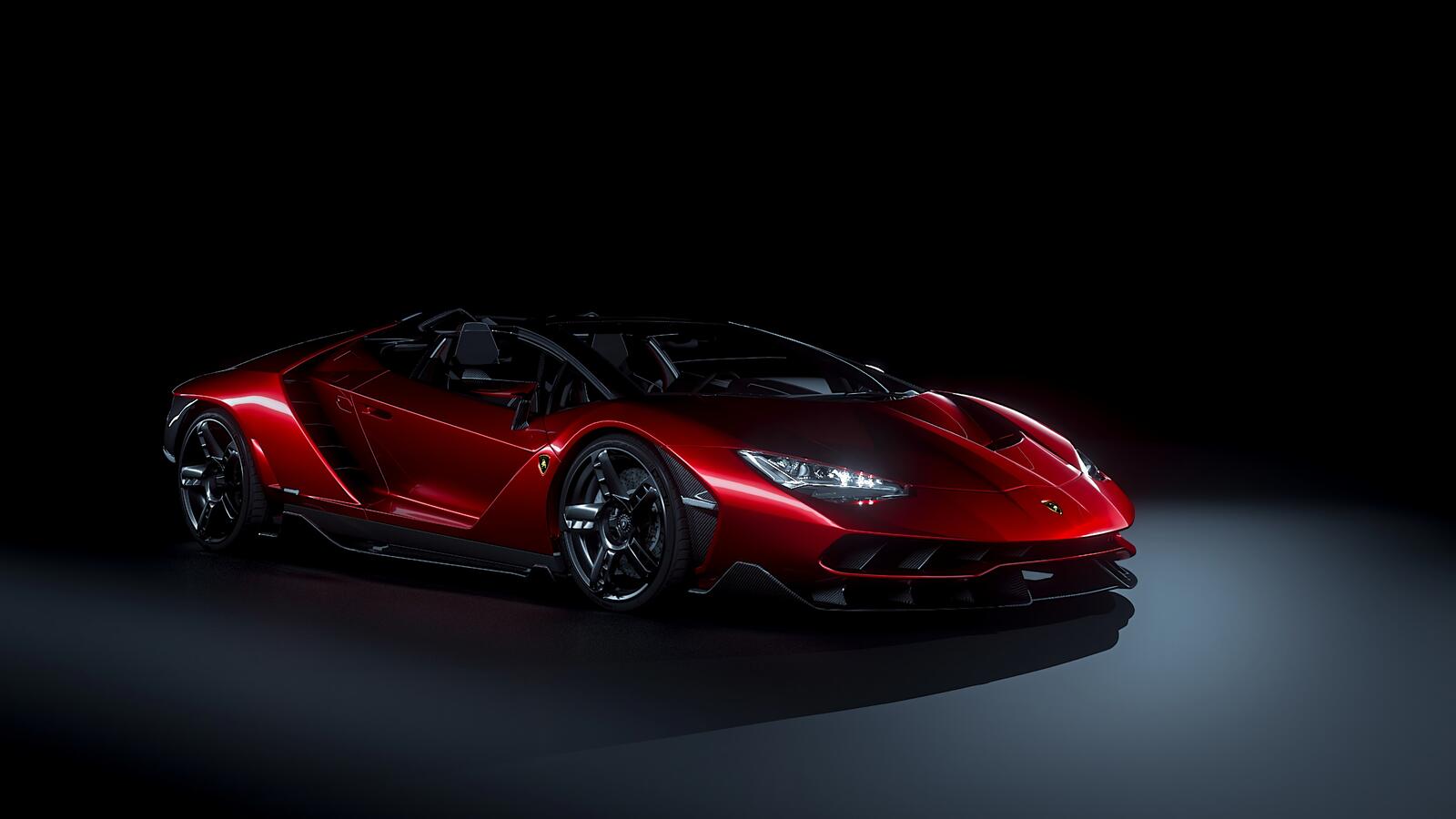 Free photo Cherry Lamborghini on a dark background