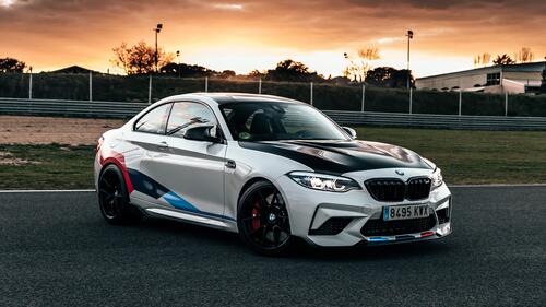 White BMW M2 Competition with black hood