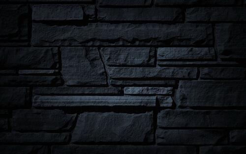 Черная каменная стена