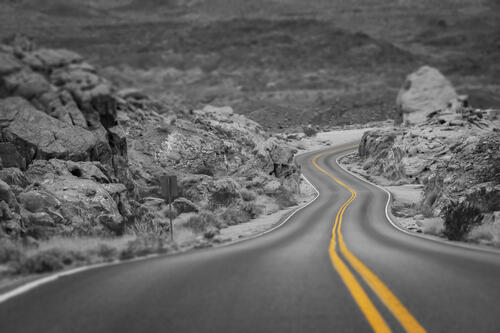 A winding country road in Nevada, in black and white