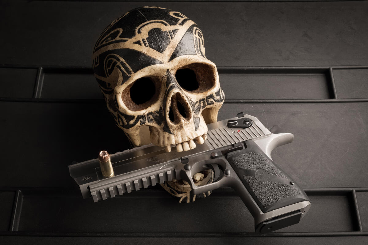 A skull with a gun