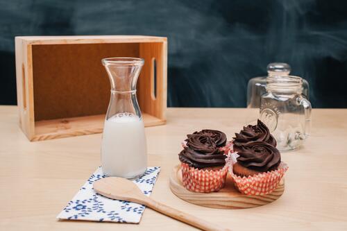 Wallpaper with delicious cupcakes and milk