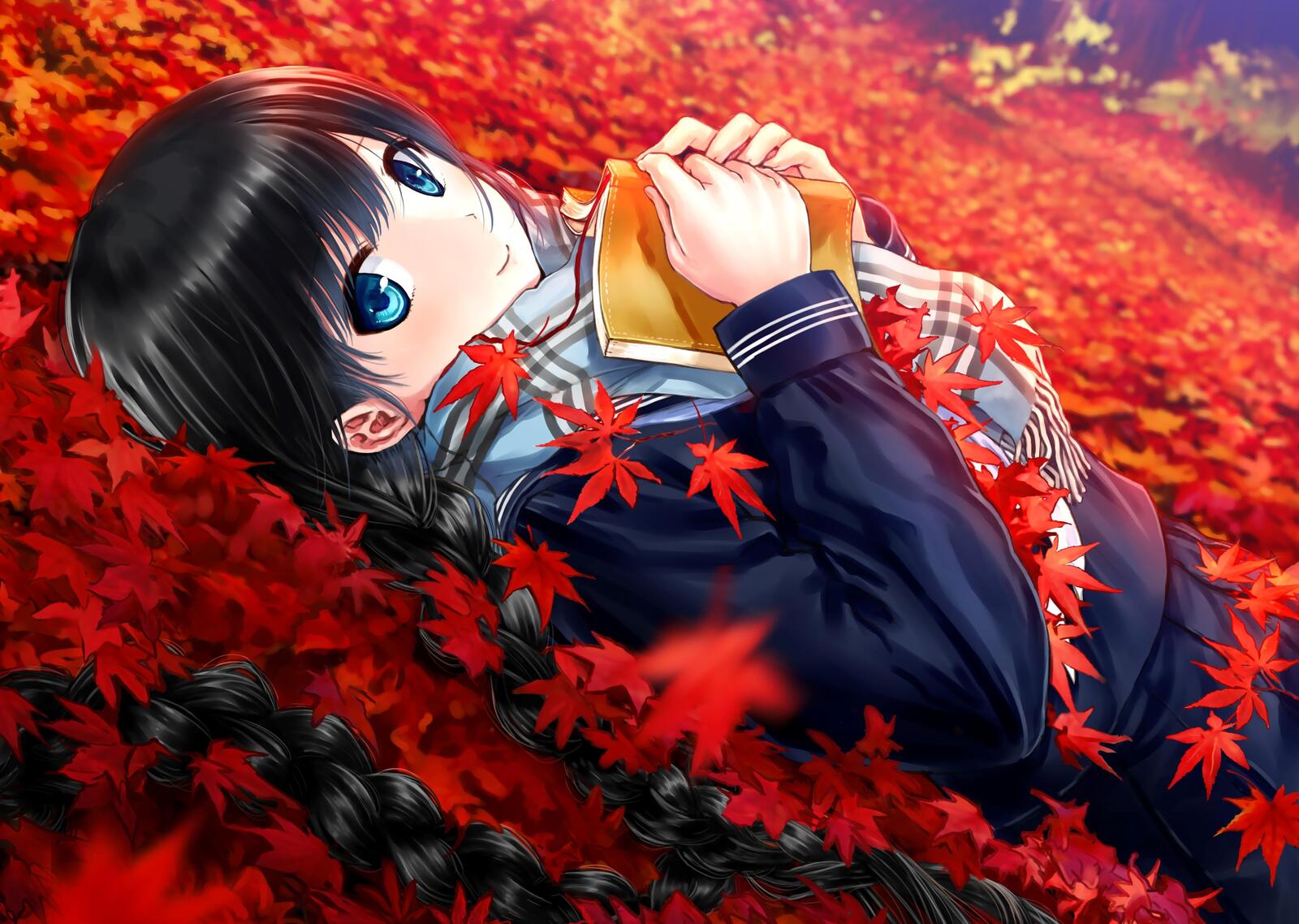 Бесплатное фото Аниме девочка лежит на кленовых красных листьях