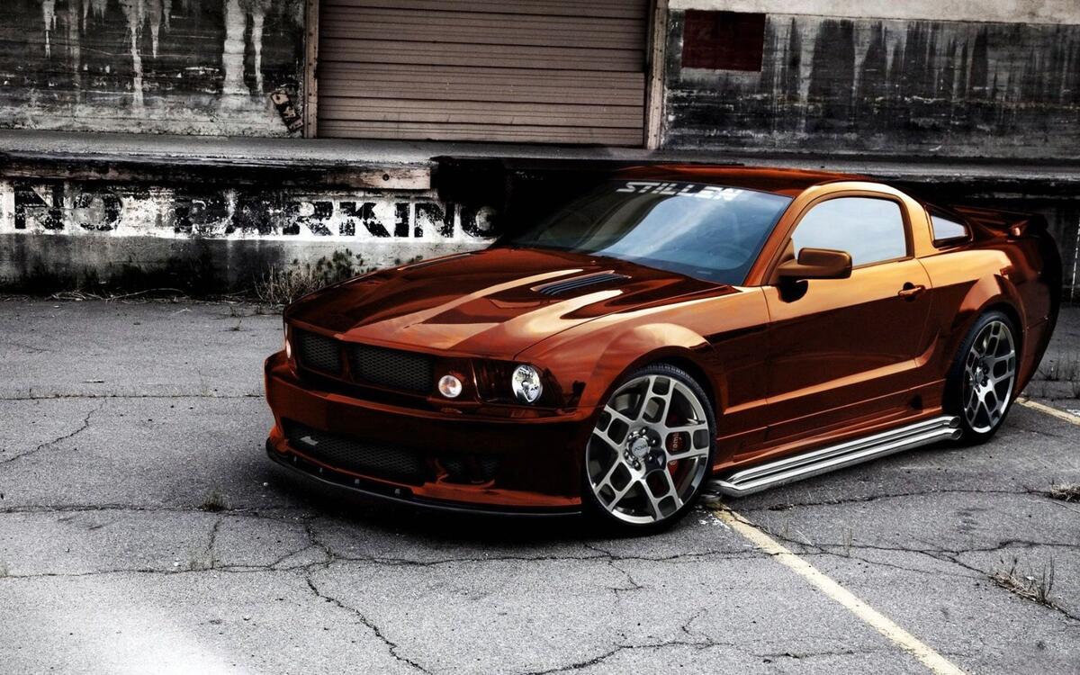 A chocolate Ford Mustang