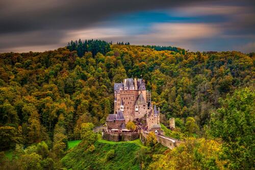 Eltz Castle in Germany amidst a forest