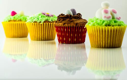 Colorful cupcakes with cream filling