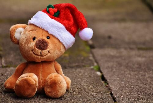 A Christmas bear in a Santa hat.