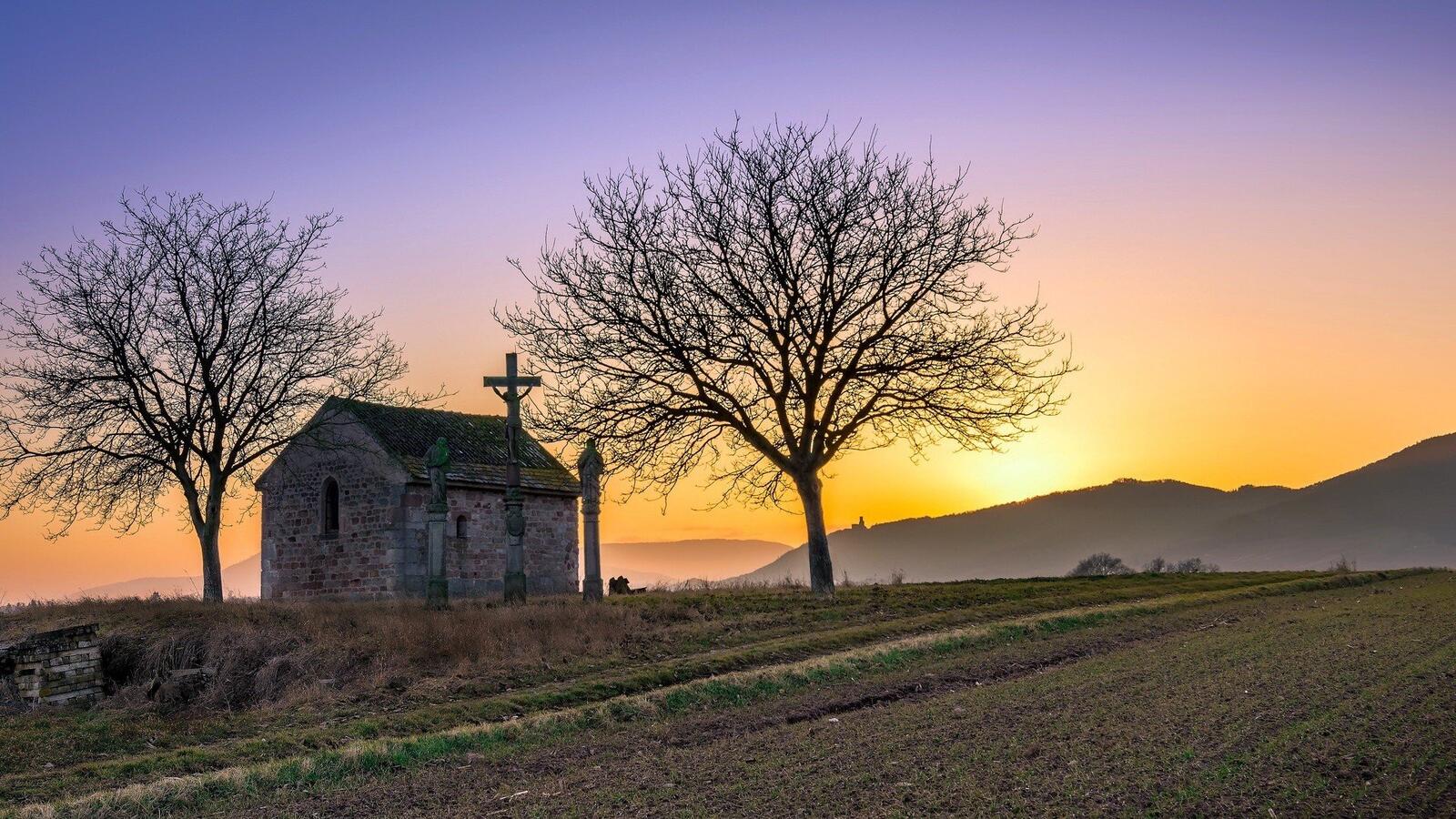 Free photo A stone church in a field