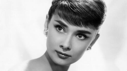 Black and white portrait of actress Audrey Hepburn