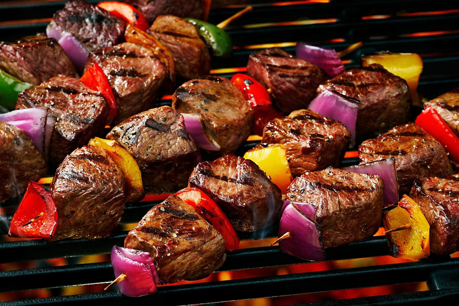 Free photo Shashlyk with vegetables on the grill
