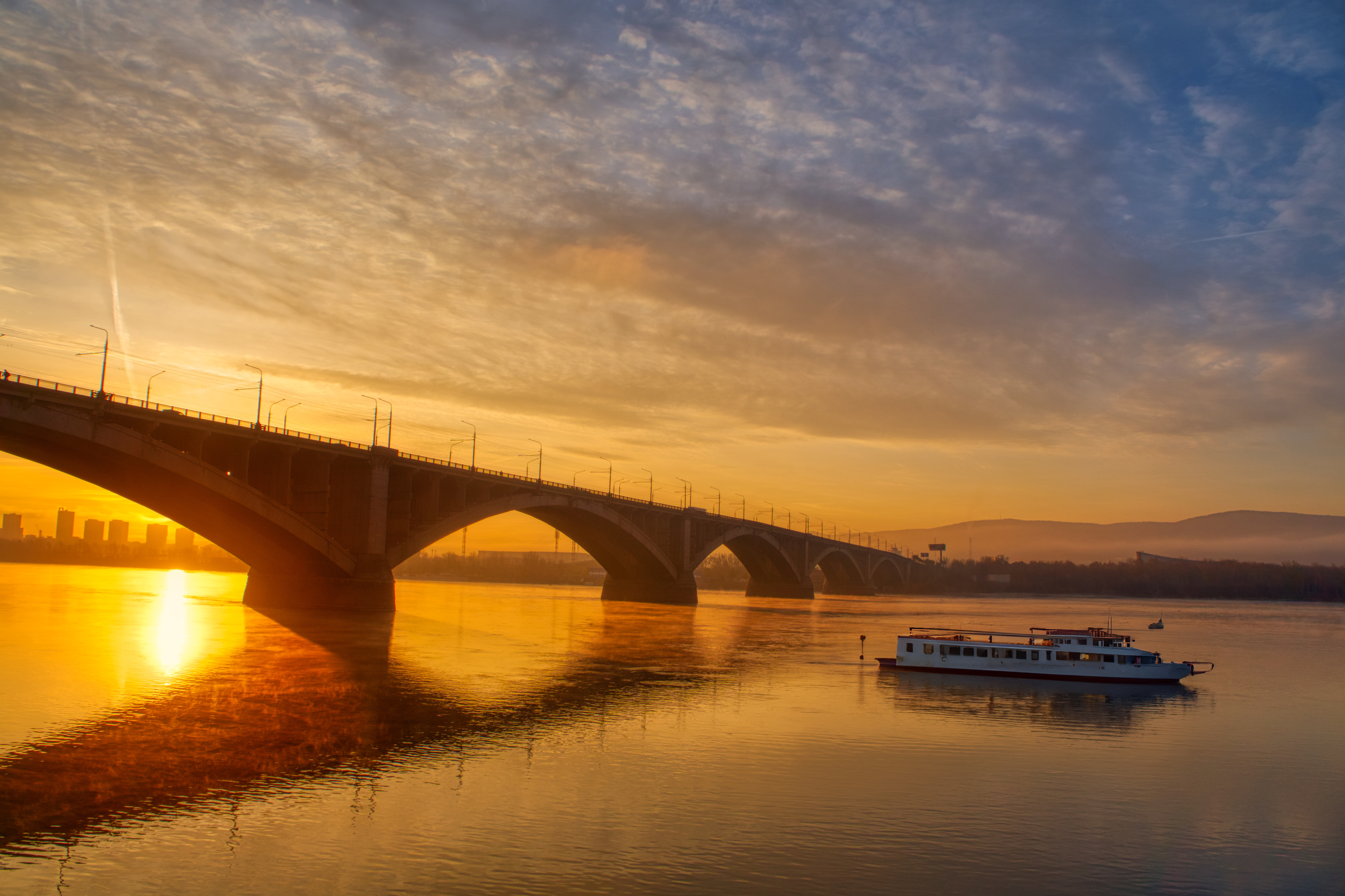 A ship at the bridge in the early morning in Krasnoyarsk
